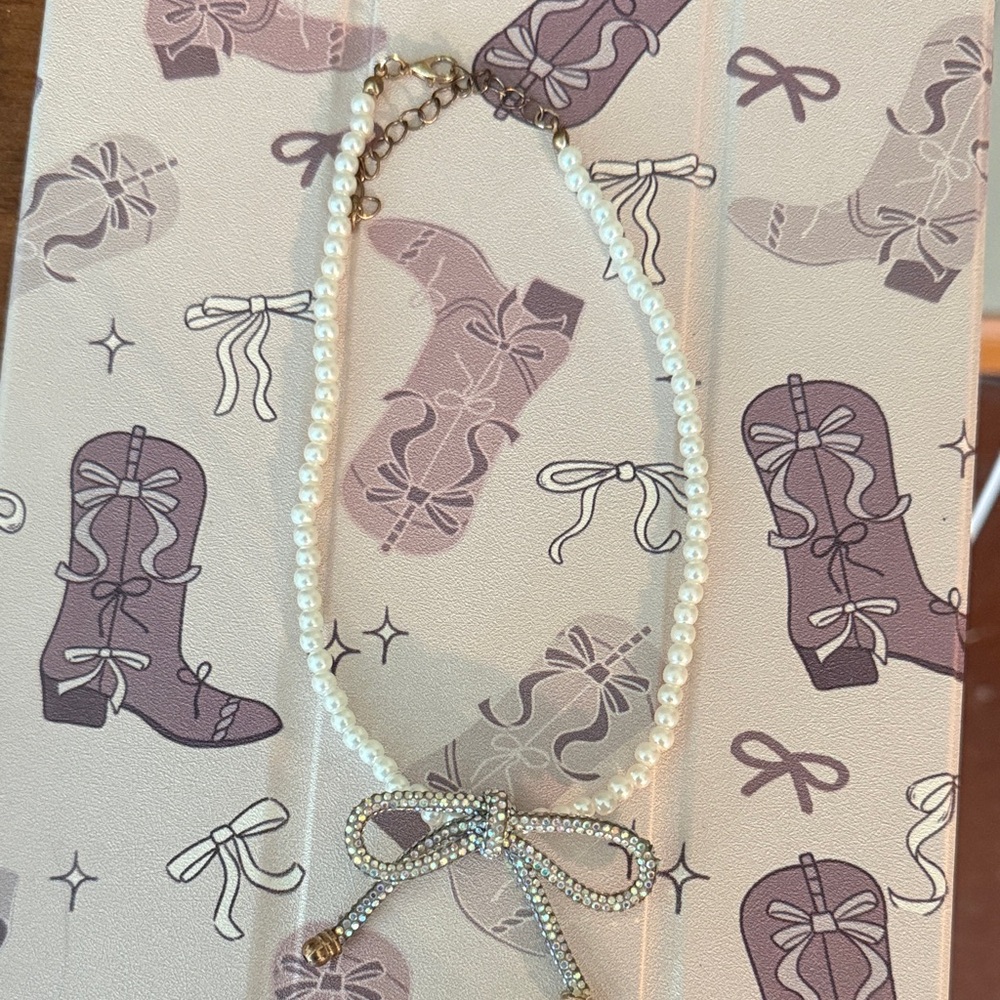 Pearl Necklace with Rhinestone Bow Pendant